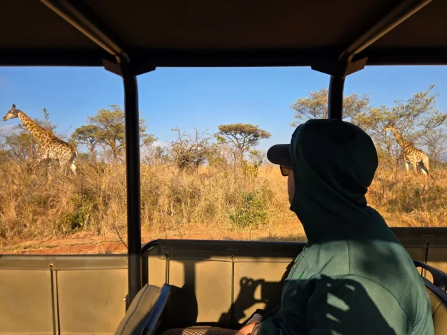 And here are some of our favorite random shots from Kruger: Andrew and his favs, me and my favs, the best coffee shop, the morning cold, cruising, and the most charming little airport.